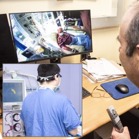 A medical expert watching live video of a patient on his computer