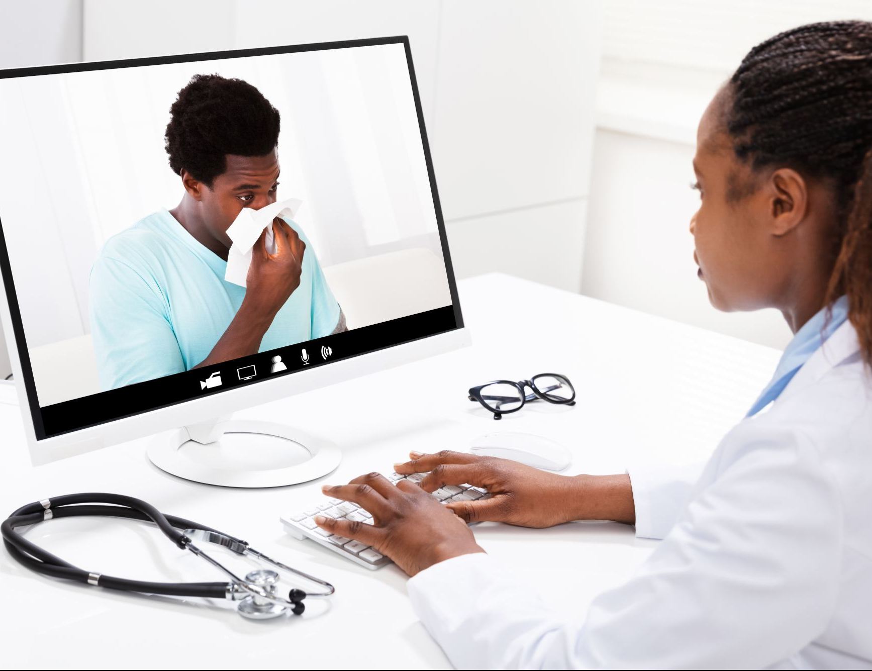Patient with flu symptoms attends video clinic